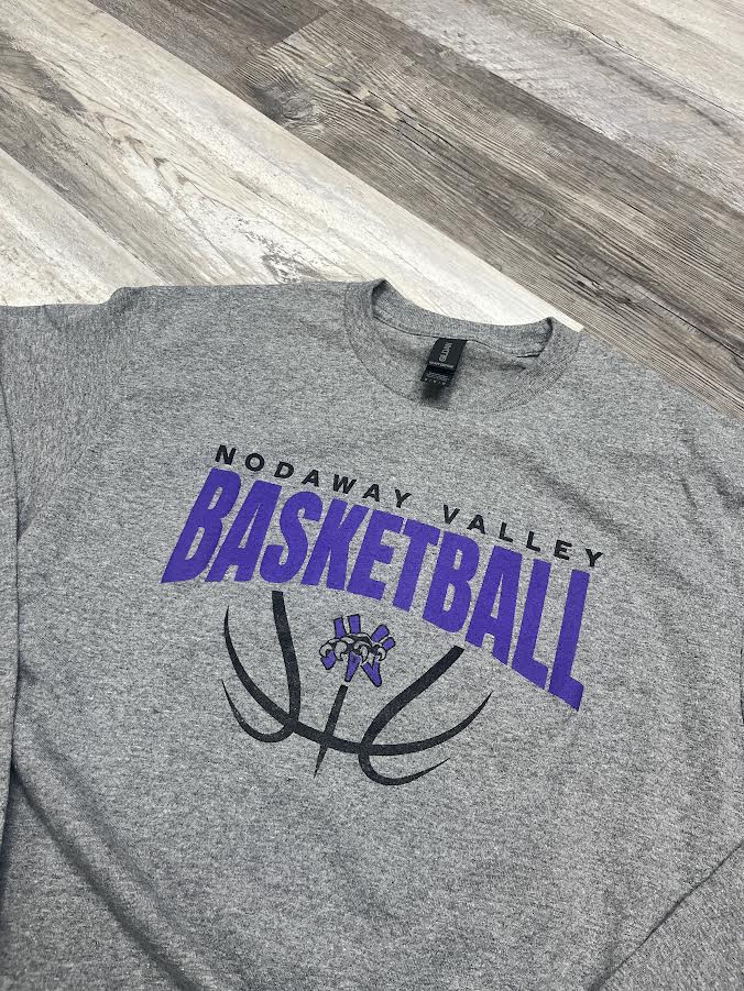Gray t-shirt with 'Nodaway Valley Basketball' text and logo on a wooden surface