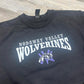 Black sweatshirt with Nodaway Valley Wolverines text & logo on the front